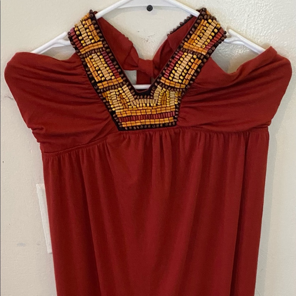 Long burgundy dress with beads sleeveless